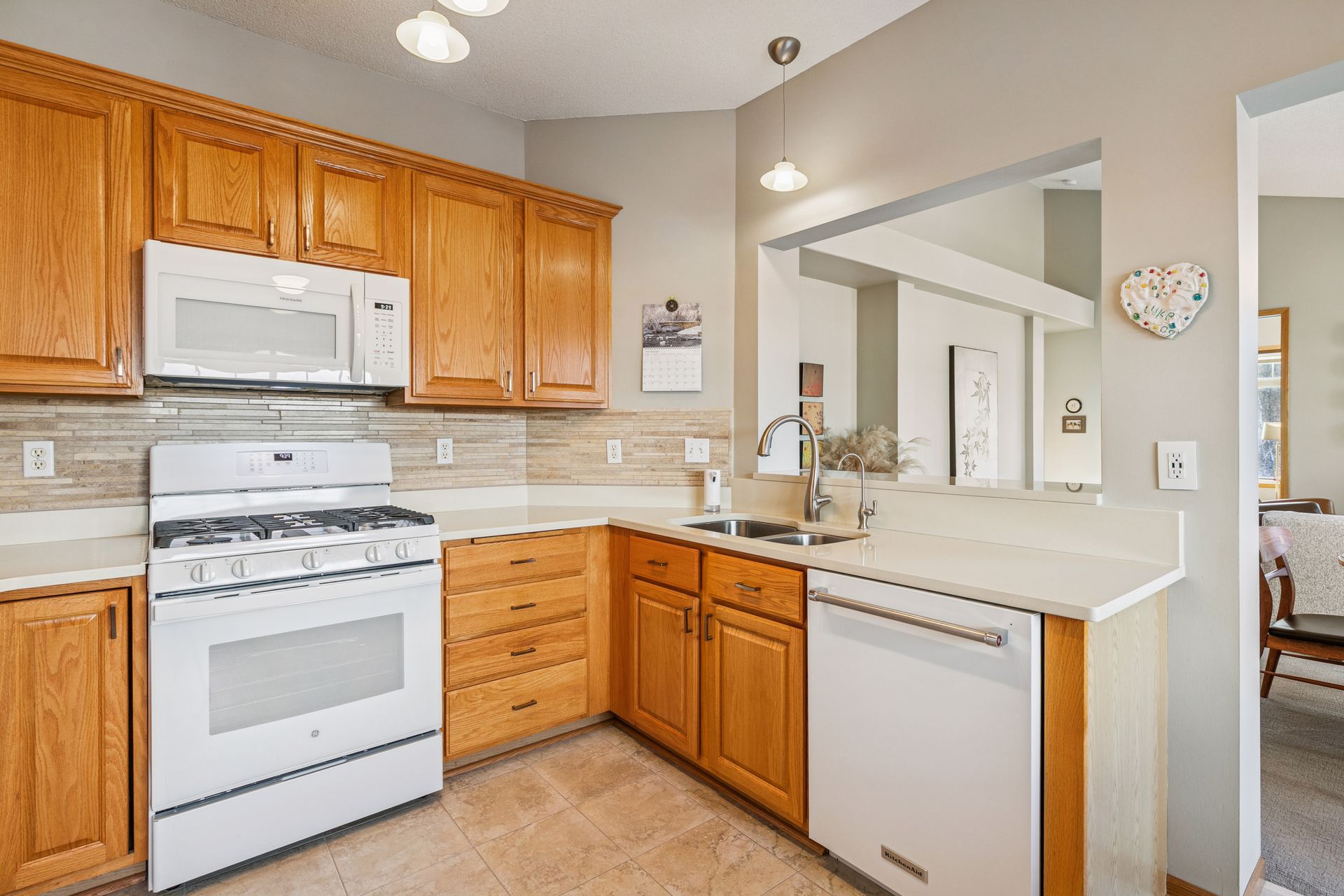 Kitchen backsplash and pendant lighting
